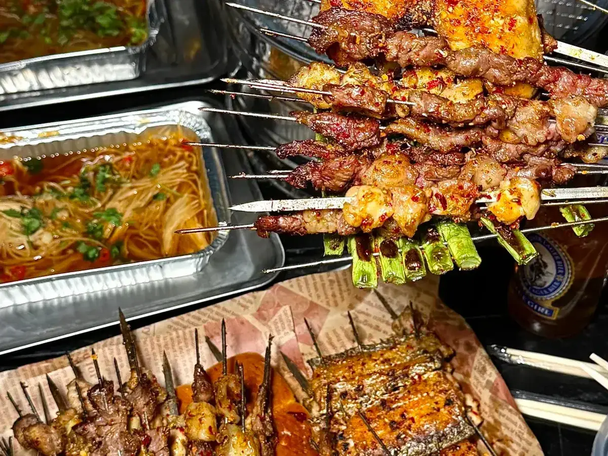 A spread of Chinese dishes on a shared table